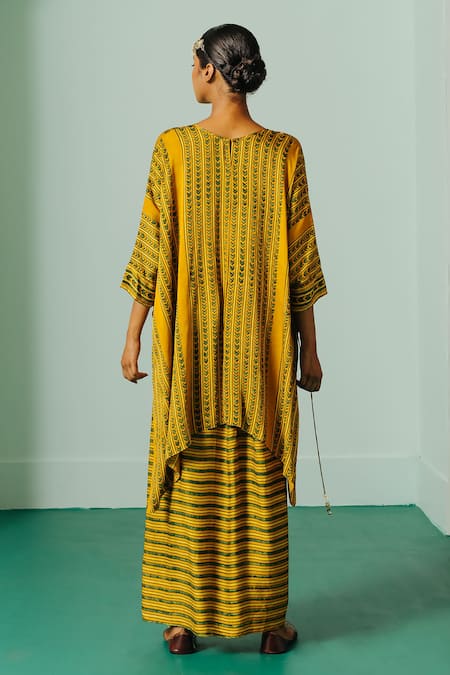 Shop Prahnaaya Yellow Satin Embroidery, Hand Block Print Asymmetrical Kaftan And Skirt Set at Aza Fashions Shop_Prahnaaya_Yellow Satin Embroidery, Hand Block Print Asymmetrical Kaftan And Skirt Set _at_Aza_Fashions