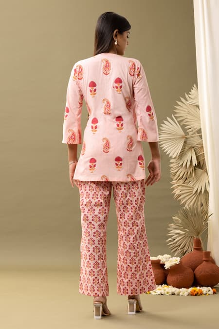 Shop Abbaran Pink Cotton Embroidery V-neck Bloom Print Angrakha And Flared Pant Set at Aza Fashions Shop_Abbaran_Pink Cotton Embroidery V-neck Bloom Print Angrakha And Flared Pant Set _at_Aza_Fashions