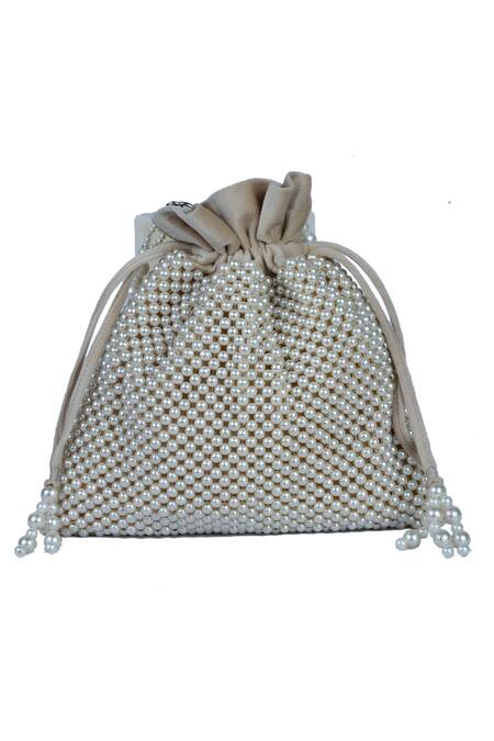 Shop Nayaab By Sonia Ivory Pearls Nacre Embroidered Potli Bag at Aza Fashions Shop_Nayaab By Sonia_Ivory Pearls Nacre Embroidered Potli Bag _at_Aza_Fashions