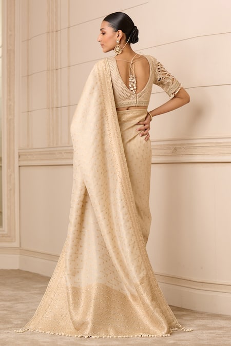 Shop Tarun Tahiliani Beige Tulle, Silk Pearls, Embroidery Round Neck Hand Saree With Blouse at Aza Fashions Shop_Tarun Tahiliani_Beige Tulle, Silk Pearls, Embroidery Round Neck Hand Saree With Blouse_at_Aza_Fashions