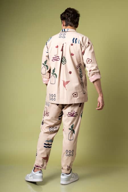 Shop Doodlage Beige Twill Abstract Print Wrap Shacket at Aza Fashions Shop_Doodlage_Beige Twill Abstract Print Wrap Shacket_at_Aza_Fashions