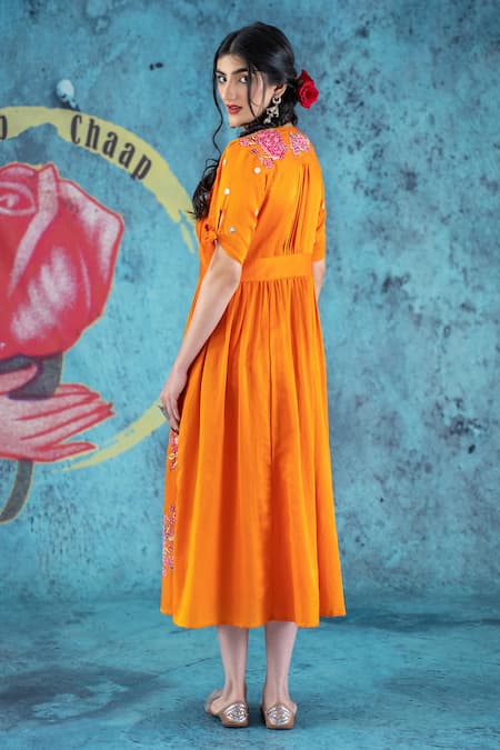 Shop Kacha Tanka Orange Cotton Satin Floral V Neck Rose Applique Dress at Aza Fashions Shop_Kacha Tanka_Orange Cotton Satin Floral V Neck Rose Applique Dress _at_Aza_Fashions