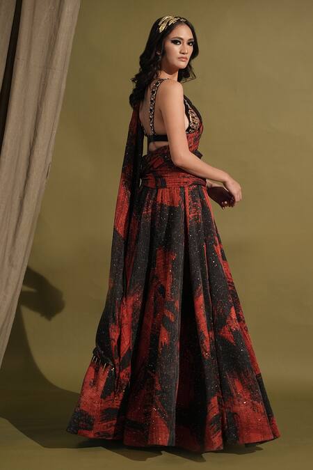 Shop_Nikita Mhaisalkar_Red Georgette Sequins, Stones Plunge Stroke Print Lehenga Saree And Blouse Set _at_Aza_Fashions