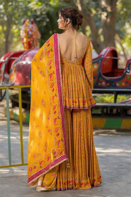 Shop Irrau By Samir Mantri Yellow Georgette Embroidery, Sequins, Tassels Floral Stripe Print Gharara Set at Aza Fashions Shop_Irrau By Samir Mantri_Yellow Georgette Embroidery, Sequins, Tassels Floral Stripe Print Gharara Set _at_Aza_Fashions