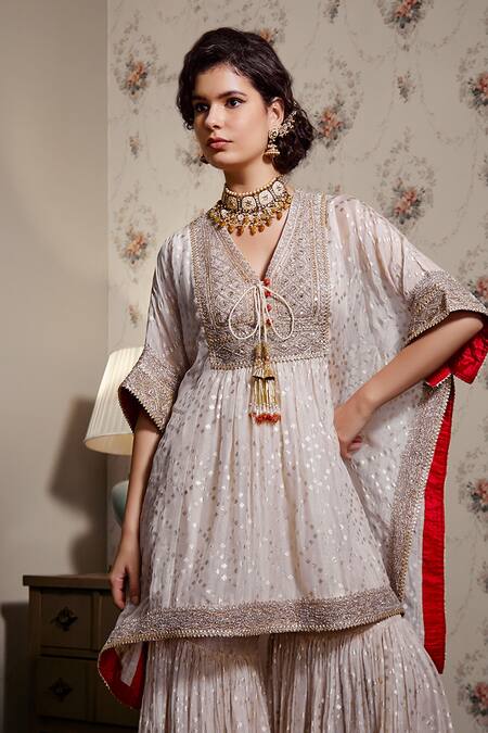 Shop Kisneel By Pam Ivory Organza, Crepe Embroidery, Sequins, Foil Printing Hand Kaftan Gharara Set at Aza Fashions Shop_Kisneel By Pam_Ivory Organza, Crepe Embroidery, Sequins, Foil Printing Hand Kaftan Gharara Set_at_Aza_Fashions