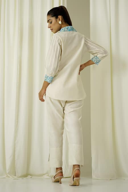 Shop Sakshi Khetterpal Ivory Chanderi Pearls, Beads, Embroidery Front Buttoned Shirt And Pant Set at Aza Fashions Shop_Sakshi Khetterpal_Ivory Chanderi Pearls, Beads, Embroidery Front Buttoned Shirt And Pant Set _at_Aza_Fashions