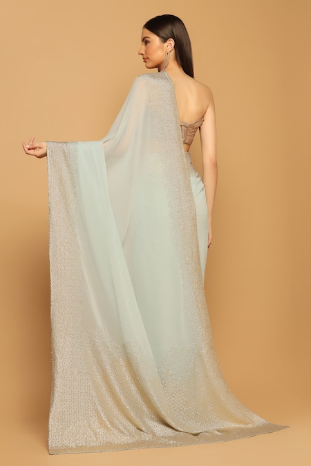 Shop Two Sisters By Gyans Blue Georgette Sequins Border Embroidered Saree With Unstitched Blouse Fabric at Aza Fashions Shop_Two Sisters By Gyans_Blue Georgette Sequins Border Embroidered Saree With Unstitched Blouse Fabric _at_Aza_Fashions