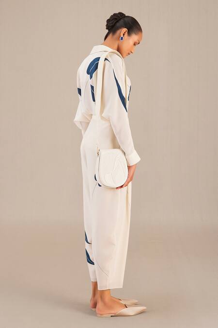 Shop Ampm Ivory Embroidery Zyna Peacock Embossed Sling Bag at Aza Fashions Shop_Ampm_Ivory Embroidery Zyna Peacock Embossed Sling Bag_at_Aza_Fashions