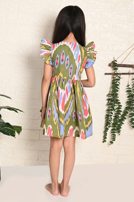 Shop THE COTTON STAPLE Green Cotton Maple Wrap Bodice Dress at Aza Fashions Shop_THE COTTON STAPLE_Green Cotton Maple Wrap Bodice Dress _at_Aza_Fashions