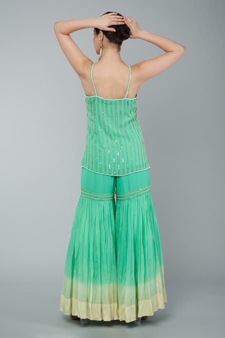 Shop Keith Gomes Green Net, Crepe, Chiffon, Georgette Beads, Embroidered Tunic Gharara Set at Aza Fashions Shop_Keith Gomes_Green Net, Crepe, Chiffon, Georgette Beads, Embroidered Tunic Gharara Set _at_Aza_Fashions