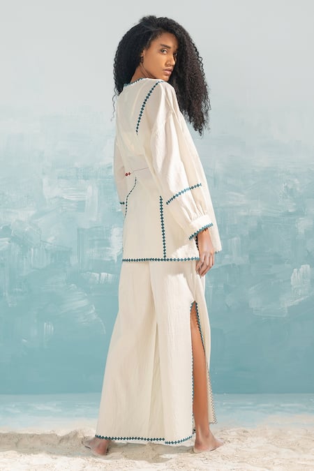 Shop_Ikai by Ragini Ahuja_Ivory Cotton Applique, Cut Work V-neck Nile Overlap Wrap Top _at_Aza_Fashions