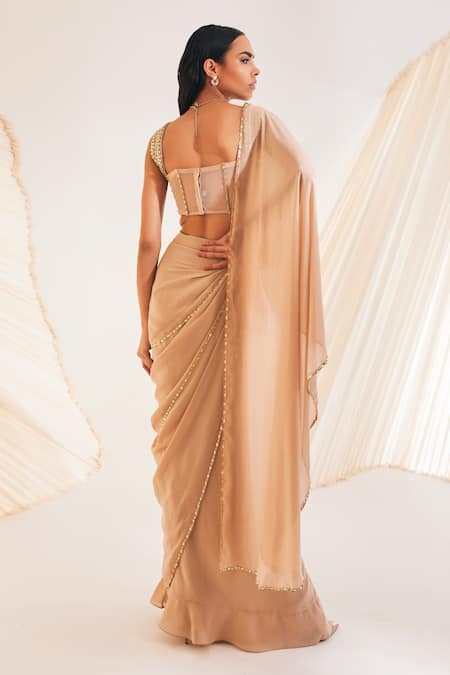 Shop Divya Aggarwal Beige Georgette, Satin, Tulle Hertha Pre-draped Saree With Corset Blouse at Aza Fashions Shop_Divya Aggarwal_Beige Georgette, Satin, Tulle Hertha Pre-draped Saree With Corset Blouse _at_Aza_Fashions
