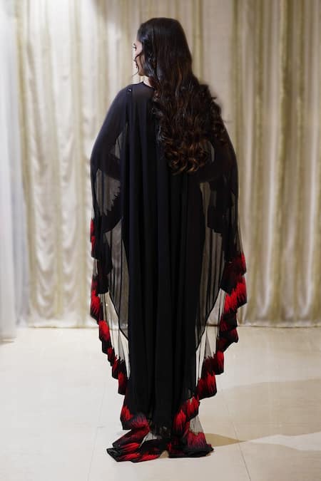 Shop Archana Kochhar Black Georgette, Lycra, Net Cosmic Dhoti Jumpsuit With Fireburst Cape Top at Aza Fashions Shop_Archana Kochhar_Black Georgette, Lycra, Net Cosmic Dhoti Jumpsuit With Fireburst Cape Top _at_Aza_Fashions