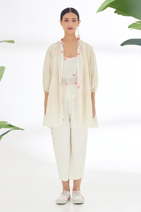 Shop Nikasha Cream Handwoven Jamdani Cotton Polka Dots, Heart Reversible Tiered Jacket at Aza Fashions Shop_Nikasha_Cream Handwoven Jamdani Cotton Polka Dots, Heart Reversible Tiered Jacket _at_Aza_Fashions
