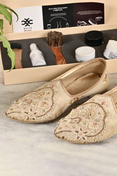 Shop_Soniya G_Cream Pu, Silk Cloth Floral Embroidered Pointed Toe Juttis_at_Aza_Fashions