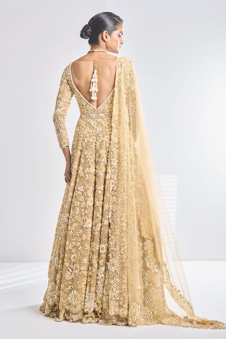 Seema Gujral_Gold Net Floral Plunge V Neck Embroidered Jacket Lehenga Set _Online_at_Aza_Fashions