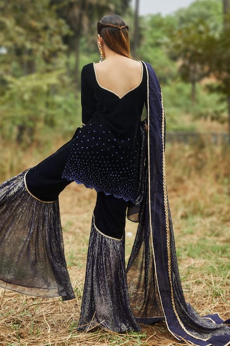 Shop Monk & Mei By Sonia Anand Blue Velvet, Georgette, Organza Sequins V-neck Embroidered Kurta Sharara Set at Aza Fashions Shop_Monk & Mei By Sonia Anand_Blue Velvet, Georgette, Organza Sequins V-neck Embroidered Kurta Sharara Set _at_Aza_Fashions