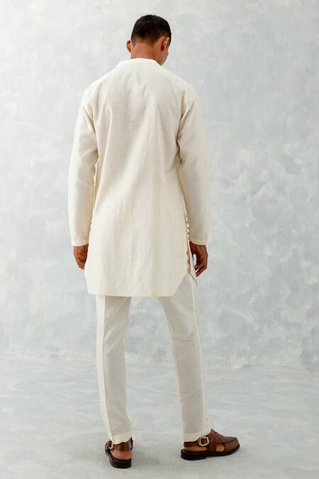 Shop_Devnaagri_Ivory Silk, Chanderi, Cotton Embroidery Floral Kurta With Pant _at_Aza_Fashions