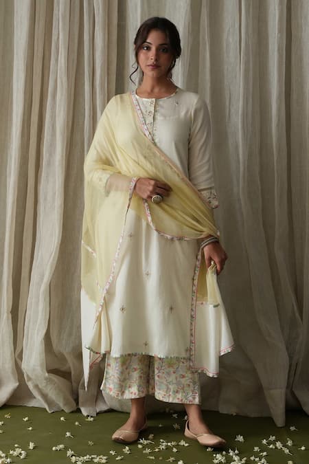 Shop Kanika Sharma Off White Cotton, Modal, Kota Doria Embroidery Round Kurta Printed Palazzo Set at Aza Fashions Shop_Kanika Sharma_Off White Cotton, Modal, Kota Doria Embroidery Round Kurta Printed Palazzo Set _at_Aza_Fashions