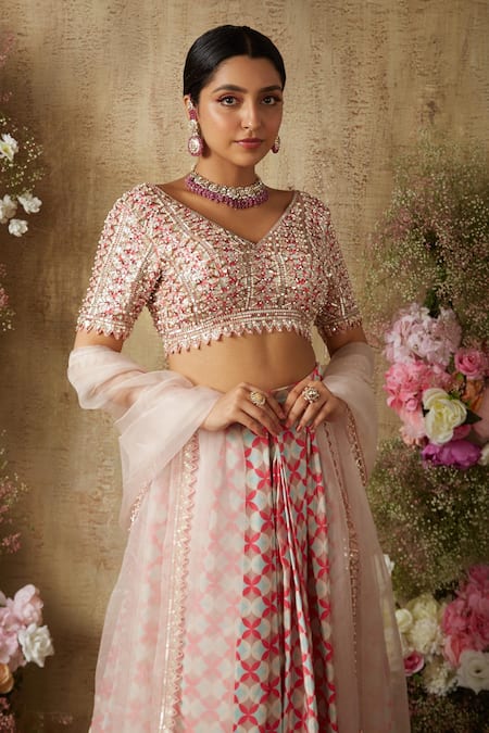 Shop Ria Shah Label Pink Polyester, Organza Sequins, Crystals V-neck Embellished Lehenga Set at Aza Fashions Shop_Ria Shah Label_Pink Polyester, Organza Sequins, Crystals V-neck Embellished Lehenga Set _at_Aza_Fashions