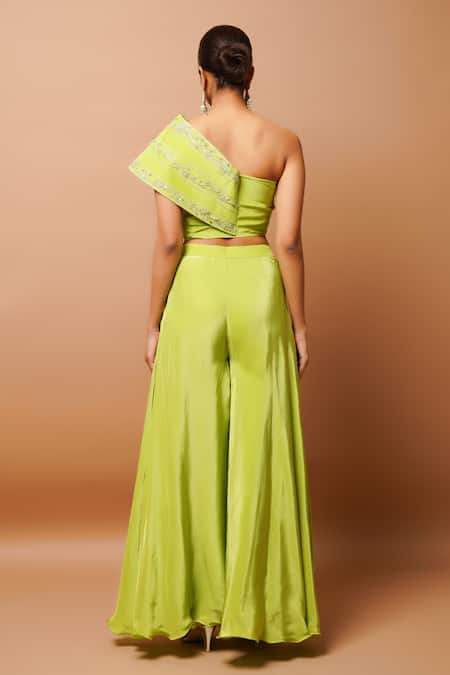 Shop Ahi Clothing Green Crepe Sequins, Zari One Shoulder Embroidered Bustier And Palazzo Set at Aza Fashions Shop_Ahi Clothing_Green Crepe Sequins, Zari One Shoulder Embroidered Bustier And Palazzo Set _at_Aza_Fashions