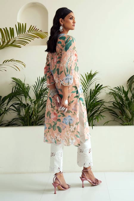 Shop Sage Saga Peach Linen, Chanderi, Pearls, Butterfly Cut-out Border Kurta Pant Set at Aza Fashions Shop_Sage Saga_Peach Linen, Chanderi, Pearls, Butterfly Cut-out Border Kurta Pant Set _at_Aza_Fashions