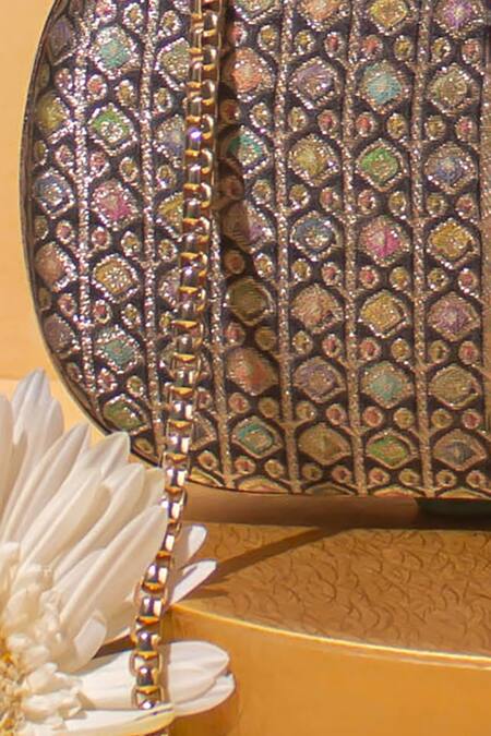 Shop Amyra Black Applique Onyx Capsule Clutch at Aza Fashions Shop_Amyra_Black Applique Onyx Capsule Clutch_at_Aza_Fashions