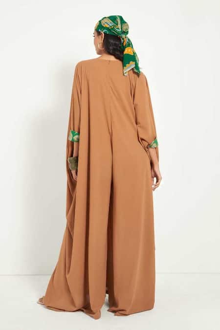 Shop Style Junkiie Beige Crepe Embroidery Halter Neck Flared Jumpsuit at Aza Fashions Shop_Style Junkiie_Beige Crepe Embroidery Halter Neck Flared Jumpsuit _at_Aza_Fashions