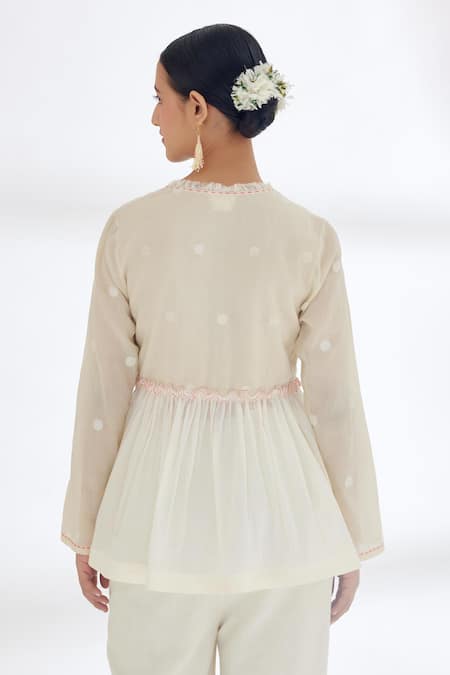Shop Nikasha Cream Handwoven Jamdani Cotton Polka Dots V Neck Wrap Top at Aza Fashions Shop_Nikasha_Cream Handwoven Jamdani Cotton Polka Dots V Neck Wrap Top _at_Aza_Fashions