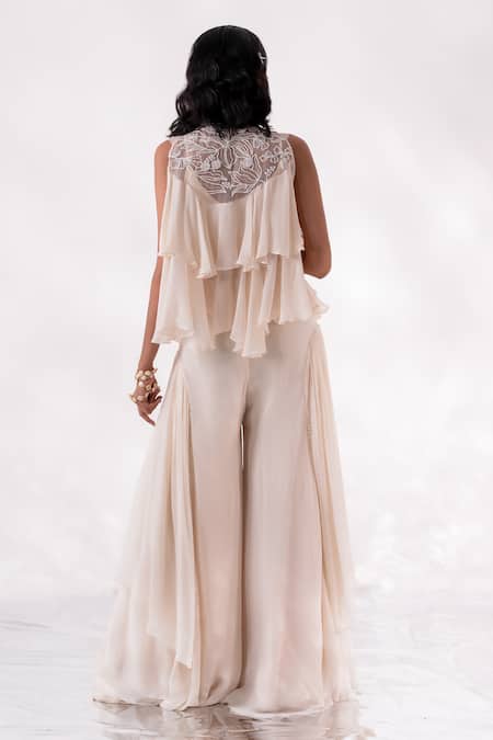 Shop PIRI INDIA Ivory Organza, Georgette Sequins, Crystals Hiya Ruffled Layered Cape Palazzo Set at Aza Fashions Shop_PIRI INDIA_Ivory Organza, Georgette Sequins, Crystals Hiya Ruffled Layered Cape Palazzo Set _at_Aza_Fashions
