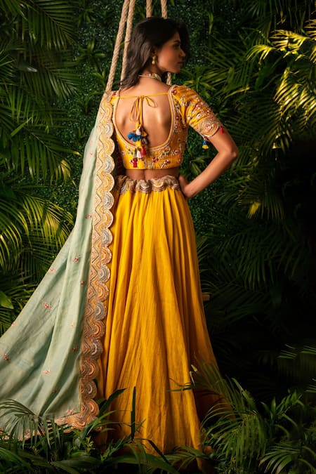 Shop Pallavi Poddar Yellow Chanderi, Silk Tassels, Embroidery Boat Neck Ganga Waistband Lehenga Set at Aza Fashions Shop_Pallavi Poddar_Yellow Chanderi, Silk Tassels, Embroidery Boat Neck Ganga Waistband Lehenga Set _at_Aza_Fashions