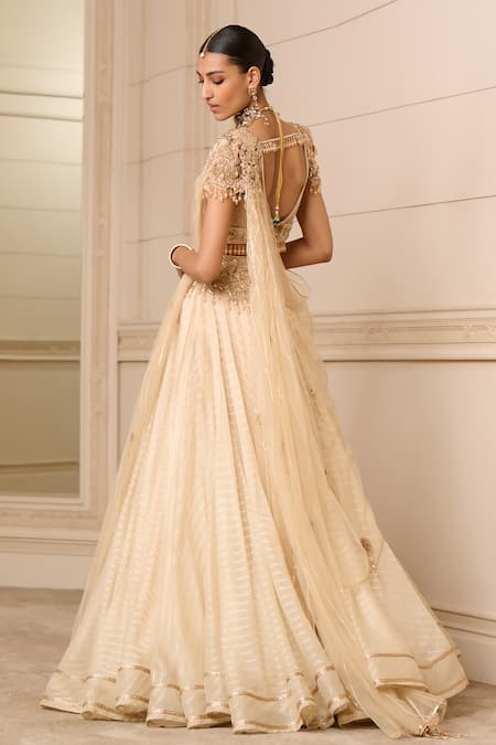Shop Tarun Tahiliani Gold Georgette, Tulle, Chanderi Sequins, Embroidery Zari Striped Lehenga Set at Aza Fashions Shop_Tarun Tahiliani_Gold Georgette, Tulle, Chanderi Sequins, Embroidery Zari Striped Lehenga Set_at_Aza_Fashions