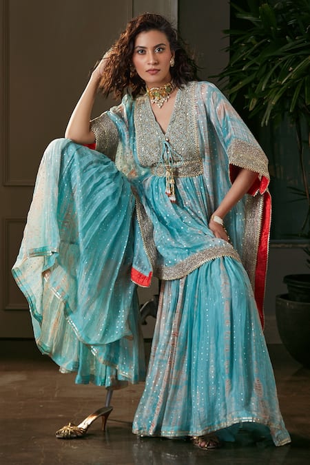 Shop Kisneel By Pam Blue Organza, Crepe Sequins, Foil Printing V-neck Embroidered Kaftan Gharara Set at Aza Fashions Shop_Kisneel By Pam_Blue Organza, Crepe Sequins, Foil Printing V-neck Embroidered Kaftan Gharara Set_at_Aza_Fashions