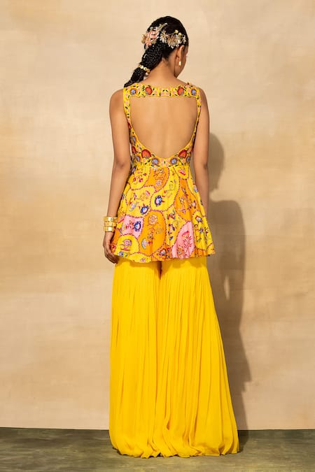 Shop_Diyarajvvir_Yellow Georgette, Cotton Cut Work, Floral Jaal Peplum Top And Gharara Pant Set _at_Aza_Fashions
