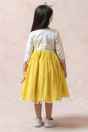 Shop Thetaa Yellow Silk, Viscose, Voile Pom-poms Stripe Pattern Flared Dress at Aza Fashions Shop_Thetaa_Yellow Silk, Viscose, Voile Pom-poms Stripe Pattern Flared Dress _at_Aza_Fashions