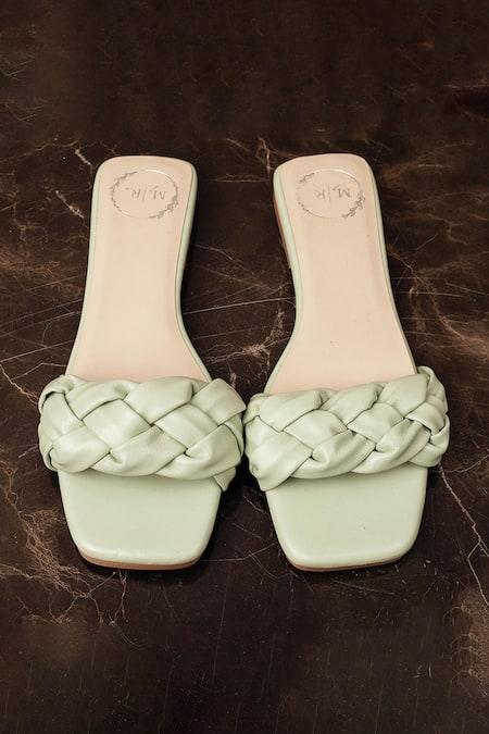 Shop_Myra_Green Plain Leather Twisted Braid Flats_at_Aza_Fashions