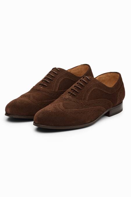 Shop Dapper Shoes Brown Handcrafted Leather Wingtip Oxford Shoes at Aza Fashions Shop_Dapper Shoes_Brown Handcrafted Leather Wingtip Oxford Shoes_at_Aza_Fashions