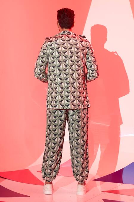 Shop Esha L Amin Multi Color Viscose, Crepe Triangle Print Joggers at Aza Fashions Shop_Esha L Amin_Multi Color Viscose, Crepe Triangle Print Joggers _at_Aza_Fashions