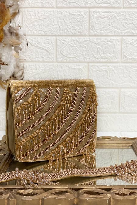 Shop Kainiche By Mehak Gold Embellished Raw Silk Clutch Bag at Aza Fashions Shop_Kainiche By Mehak_Gold Embellished Raw Silk Clutch Bag _at_Aza_Fashions