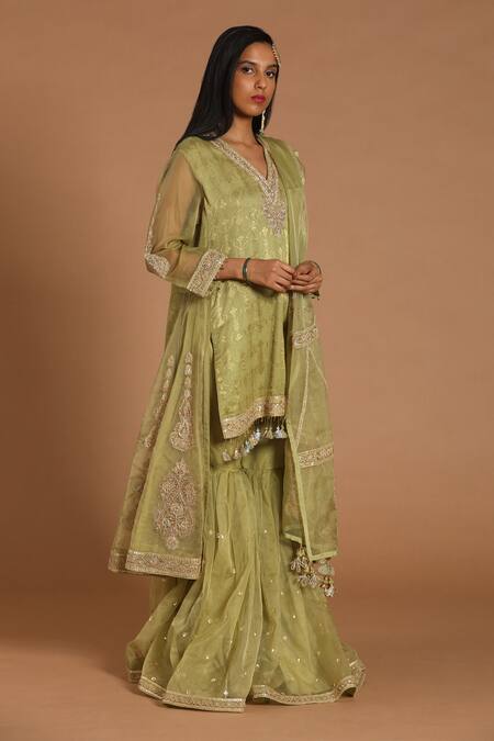 Shop Rar Studio Green Chanderi, Cotton Sequins, Tassels, Embroidery Dori Kurta Sharara Set at Aza Fashions Shop_Rar Studio_Green Chanderi, Cotton Sequins, Tassels, Embroidery Dori Kurta Sharara Set_at_Aza_Fashions