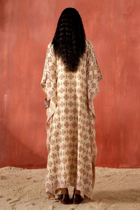 Shop Amisha Kothari Beige Cotton, Silk Tassels, Embroidery Round Neck Ambika Printed Kaftan at Aza Fashions Shop_Amisha Kothari_Beige Cotton, Silk Tassels, Embroidery Round Neck Ambika Printed Kaftan _at_Aza_Fashions