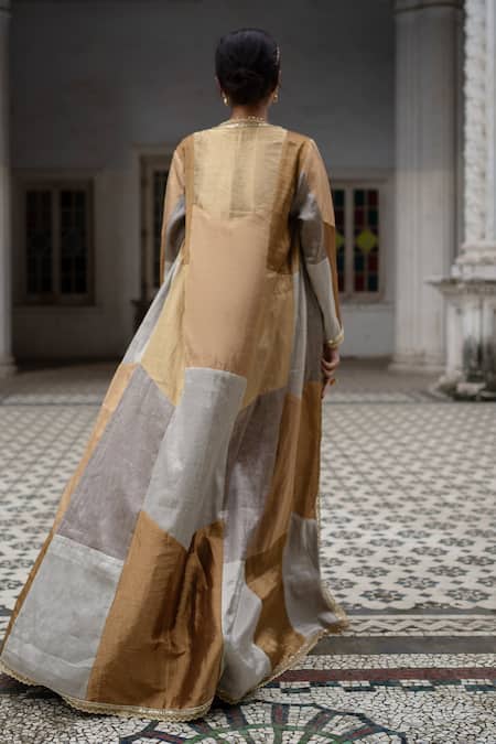 Shop Sheela Suthar Gold Tissue Embroidery, Sequins Open Neck Multi Panelled Long Jacket at Aza Fashions Shop_Sheela Suthar_Gold Tissue Embroidery, Sequins Open Neck Multi Panelled Long Jacket _at_Aza_Fashions