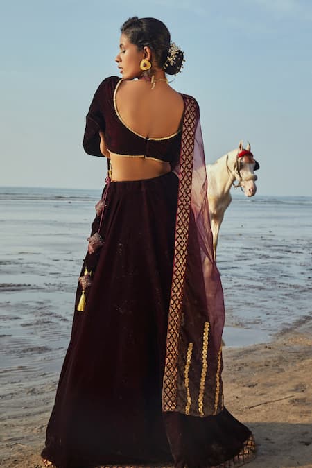 Shop Monk & Mei By Sonia Anand Wine Velvet, Organza Sequins, Embroidery V-neck Flared Lehenga Set at Aza Fashions Shop_Monk & Mei By Sonia Anand_Wine Velvet, Organza Sequins, Embroidery V-neck Flared Lehenga Set _at_Aza_Fashions