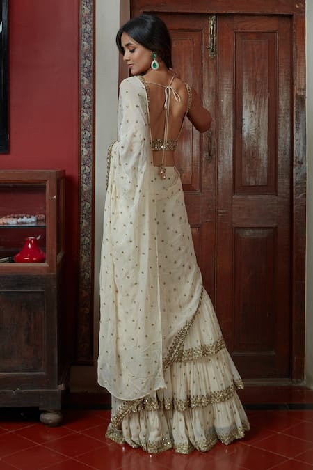 Shop Arpita Mehta Off White Georgette Mirrors, Embroidery, Tiered Pre-draped Saree With Blouse at Aza Fashions Shop_Arpita Mehta_Off White Georgette Mirrors, Embroidery, Tiered Pre-draped Saree With Blouse_at_Aza_Fashions