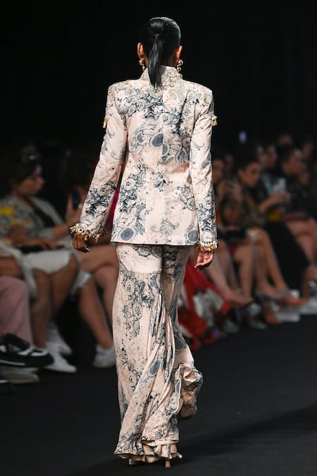 Shop Bhumika Sharma Beige Georgette Embroidery, Tassels Mandarin Blossom Print Jacket And Gharara Set at Aza Fashions Shop_Bhumika Sharma_Beige Georgette Embroidery, Tassels Mandarin Blossom Print Jacket And Gharara Set _at_Aza_Fashions