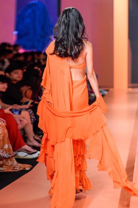 Shop Arpita Mehta Orange Georgette Halter Neck Ruffle Saree And Blouse Set at Aza Fashions Shop_Arpita Mehta_Orange Georgette Halter Neck Ruffle Saree And Blouse Set_at_Aza_Fashions