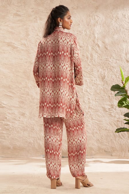 Shop Aditi Somani Pink Modal, Satin Tassels Collared Printed Shirt Tunic And Pant Set at Aza Fashions Shop_Aditi Somani_Pink Modal, Satin Tassels Collared Printed Shirt Tunic And Pant Set _at_Aza_Fashions