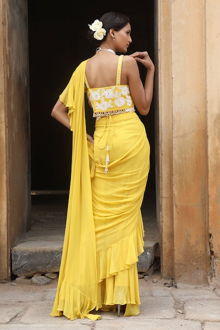 Shop_Nitisha Kashyap Official_Yellow Georgette, Silk Sequins, Beads, Zari, Pre-draped Ruffle Saree Set _at_Aza_Fashions