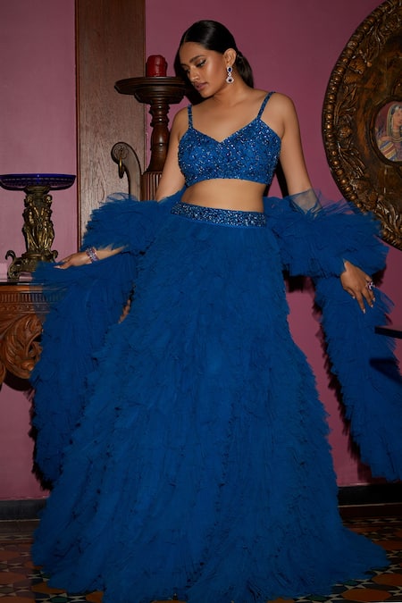 Shop Nadine Dhody Blue Tulle Sequins, Beads V-neck Delphene Ruffled Lehenga Set at Aza Fashions Shop_Nadine Dhody_Blue Tulle Sequins, Beads V-neck Delphene Ruffled Lehenga Set _at_Aza_Fashions