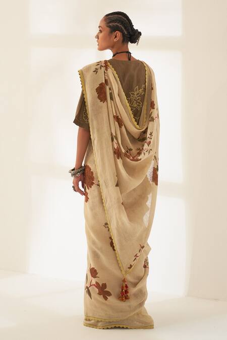 Shop Kasturi Kundal Beige Linen Tassels, Embroidery Paat Pure Handloom Saree With Unstitched Blouse at Aza Fashions Shop_Kasturi Kundal_Beige Linen Tassels, Embroidery Paat Pure Handloom Saree With Unstitched Blouse_at_Aza_Fashions